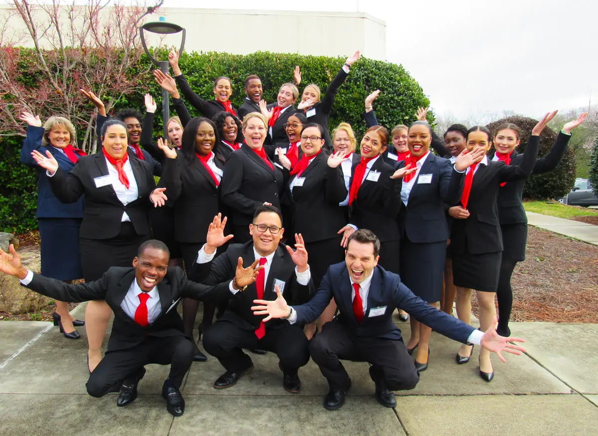Flight Attendant Preparation Program students posing together at Triad Aviation Academy